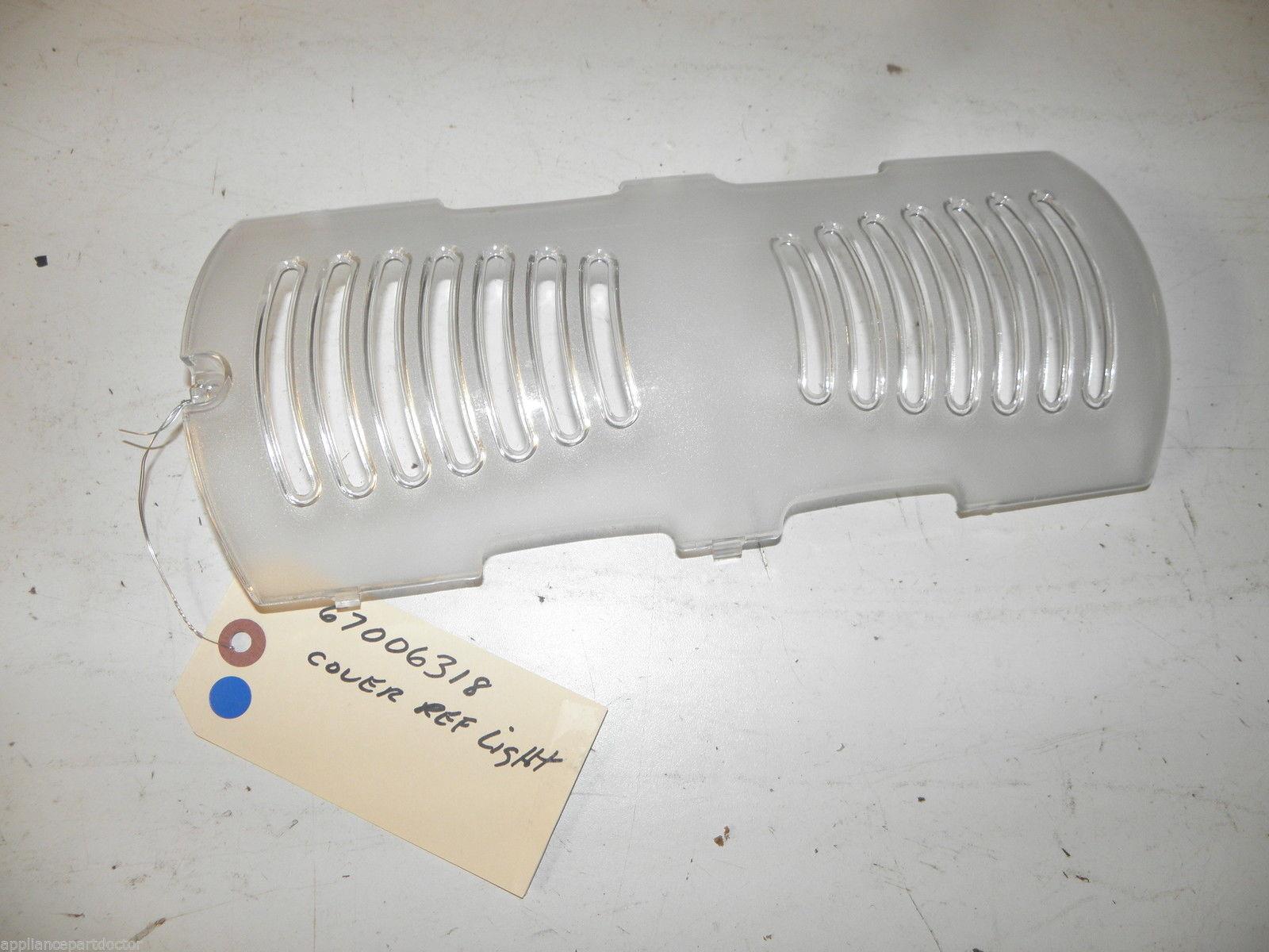 AMANA REFRIGERATOR 67006318 LIGHT COVER USED PART ASSEMBLY AMANA REFRIGERATOR 67006318 LIGHT COVER USED PART ASSEMBLY